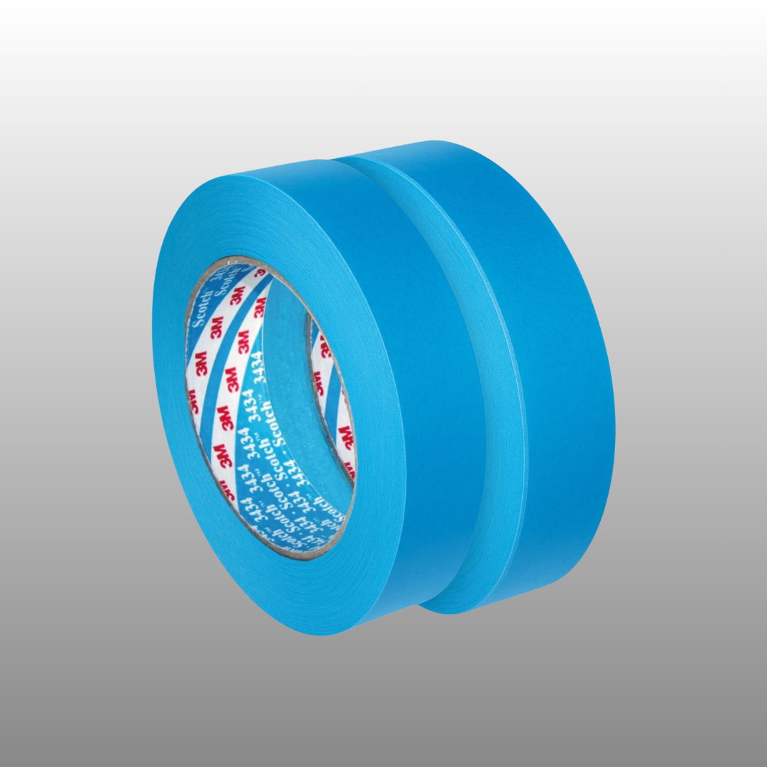 Two rolls of blue tape on a gray background