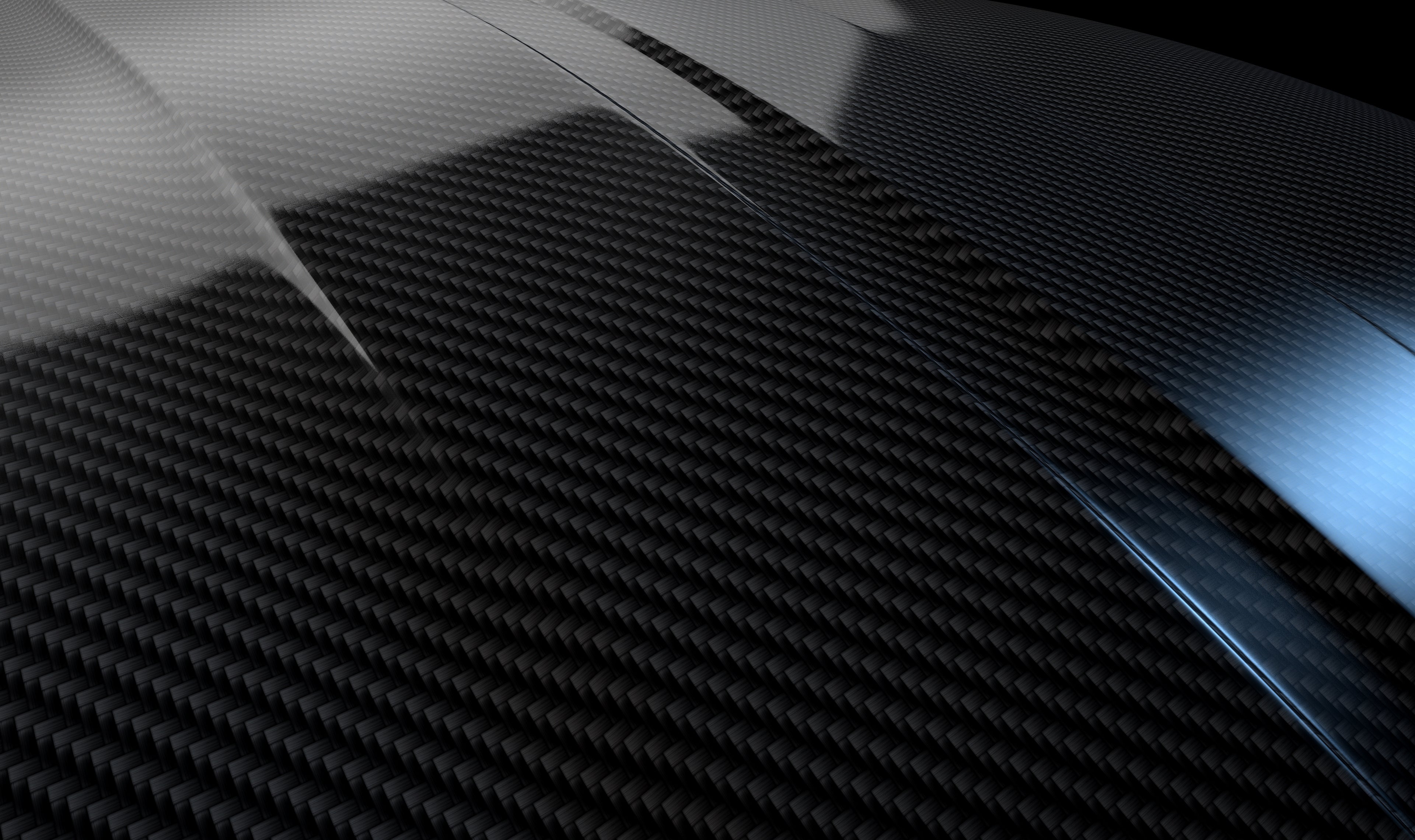 Close-up of a carbon fiber PPF surface with a glossy finish