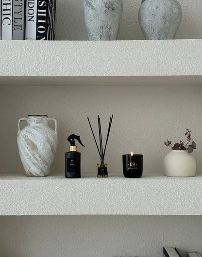 Aromatic 89 reed diffuser, room spray and candle set in a home interior