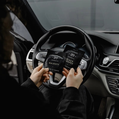 Aromatic 89 car air freshener in a car interior