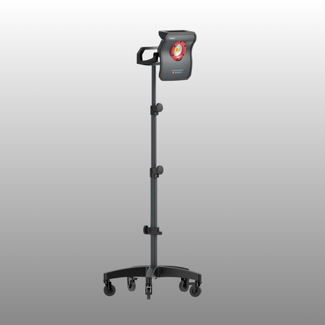 Scangrip work light mounted on tripod in detailing studio