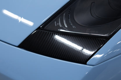 Gloss carbon fibre PPF installed on vehicle panel
