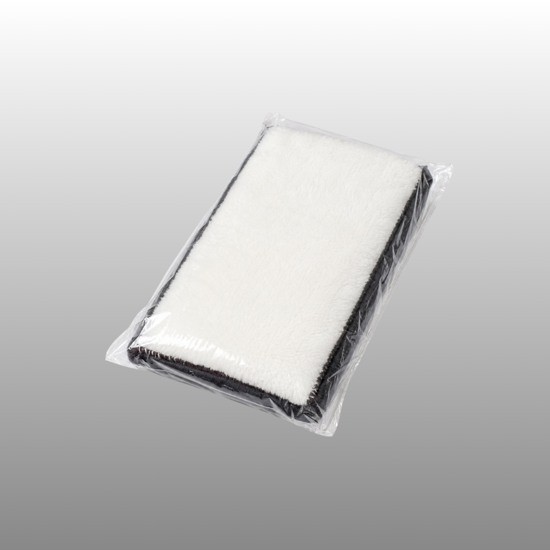 Microfibre scrub pad in clear packaging