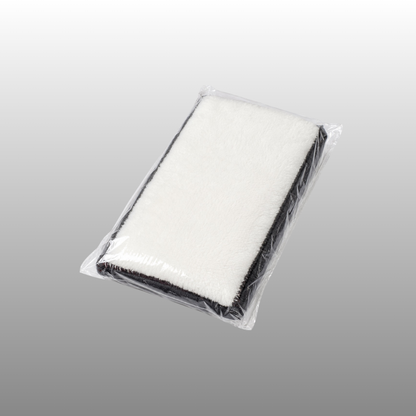 Microfibre scrub pad in clear packaging